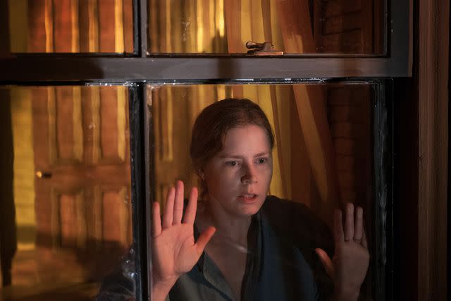 <p>Netflix</p> Amy Adams in 'The Woman in the Window,' 2021