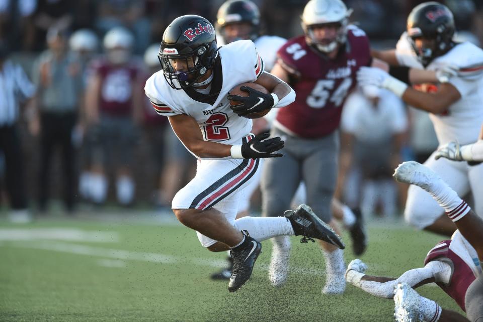 Maryville's Noah Vaughn (2) gets finds a way through the  Alcoa defense in the high school football game between the Alcoa Tornadoes and the Maryville Rebels in Alcoa, Tenn. on Friday, September 10, 2021. 