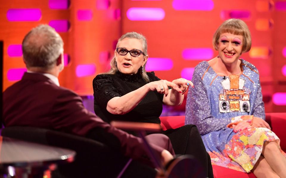 Carrie Fisher and Grayson Perry appearing on Graham Norton's sofa in 2016 - BBC