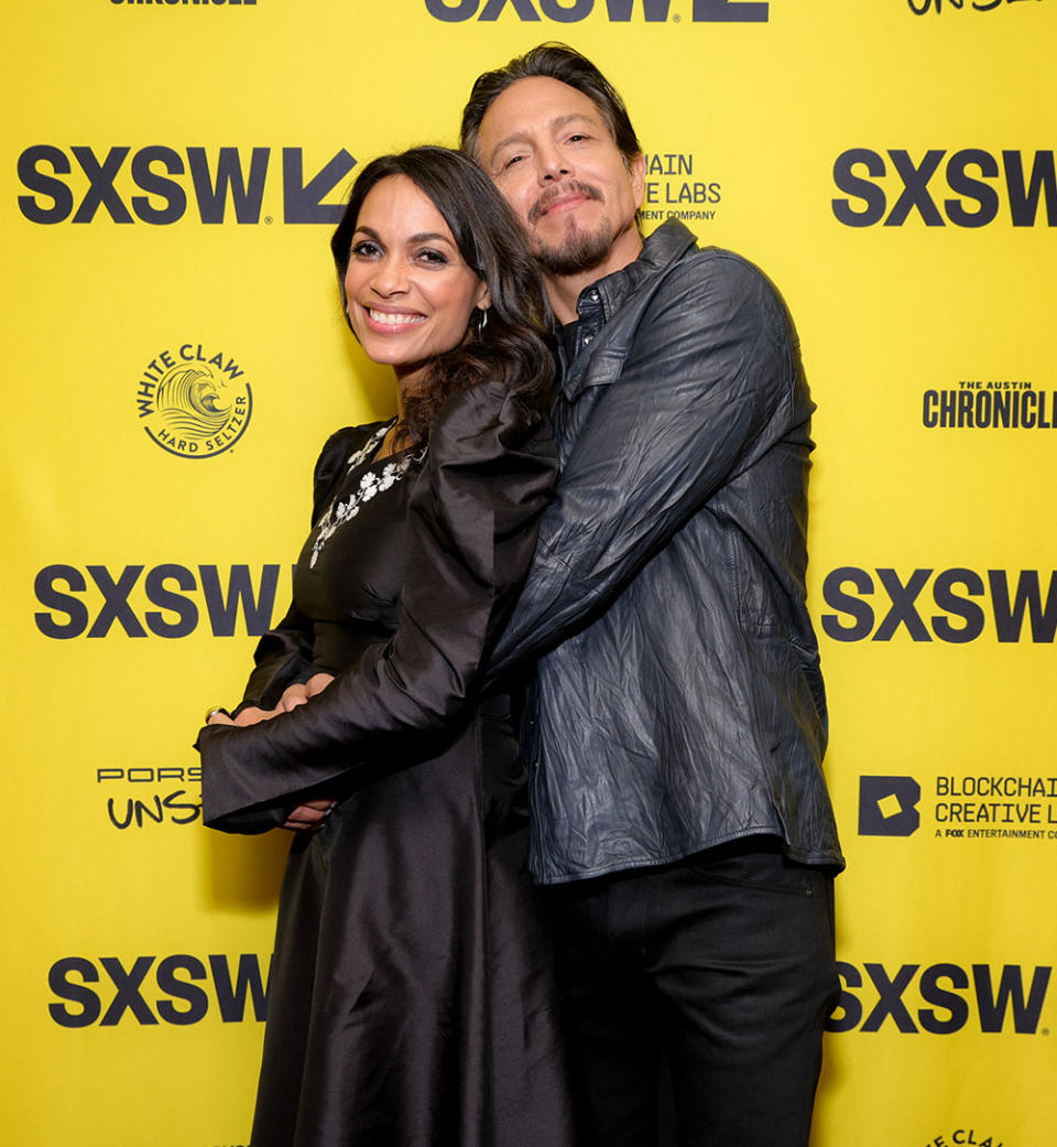 Rosario Dawson and Benjamin Bratt attend the premiere of DMZ - Credit: Rich Fury/Getty Images