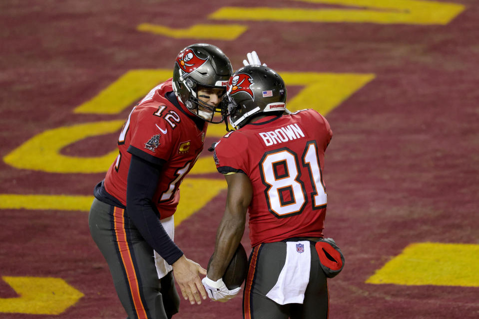 Quarterback Tom Brady #12 and wide receiver Antonio Brown #81 of the Tampa Bay Buccaneers