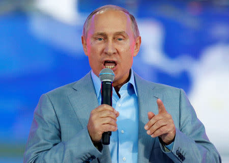 Russian President Vladimir Putin addresses participants of the 19th World Festival of Youth and Students during the closing ceremony at the Olympic Park in Sochi, Russia October 21, 2017. REUTERS/Alexander Zemlianichenko/Pool