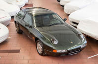 <p>Presented to <strong>Ferry Porsche</strong> in September 1984, to mark his birthday, the 928-4 also featured projector headlights in place of the usual pop-up items, while there was also green-tinted glass and a unique leather interior finished in green. The car now sits in Porsche's museum in <strong>Stuttgart</strong>.</p>