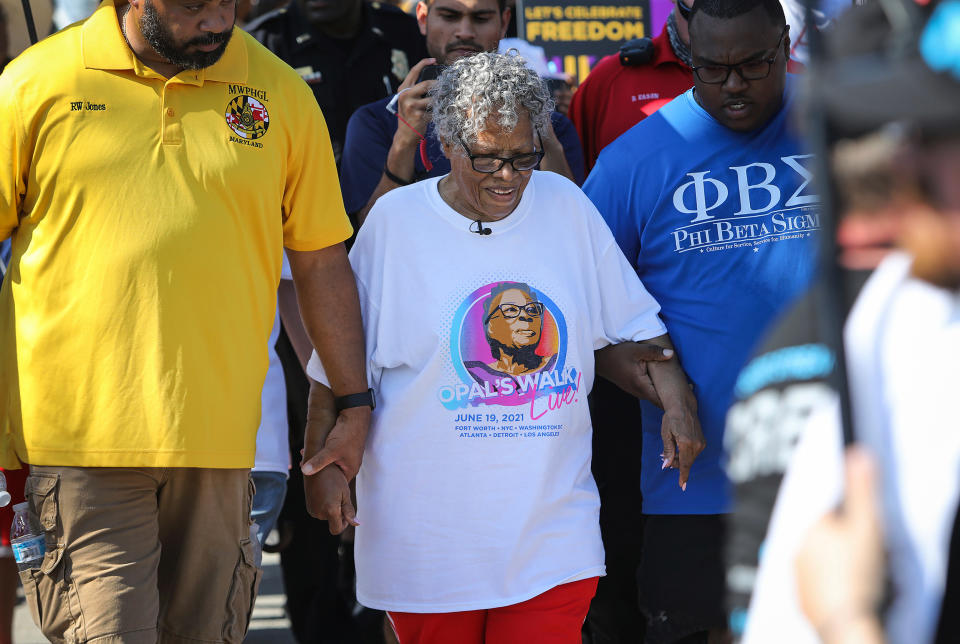 Opal Lee, 94, walks towards downtown Fort Worth, Texas from Evans Avenue Plaza (Amanda McCoy / Star-Telegram / AP)