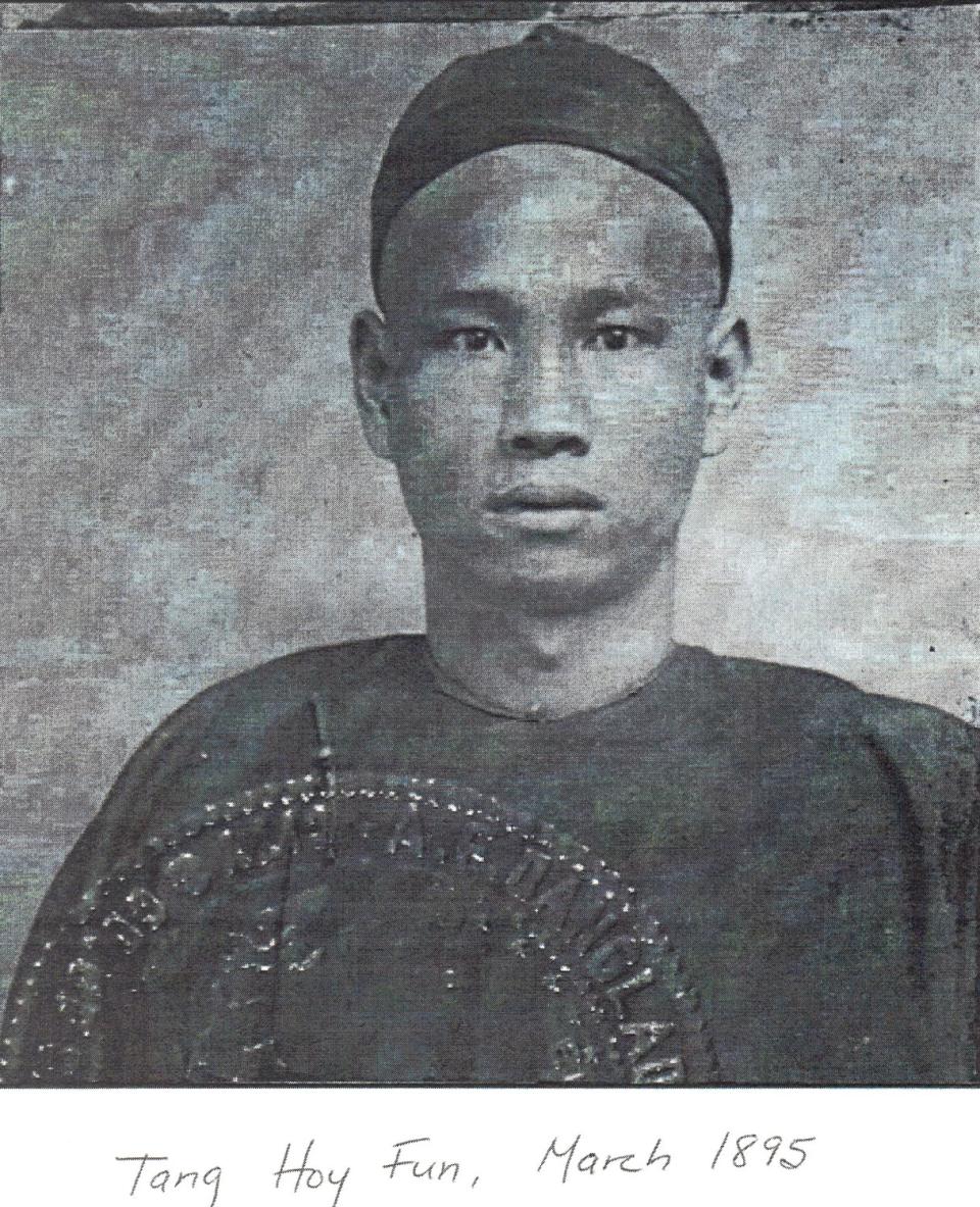 A man in a skullcap and traditional Chinese gown in the late 19th century