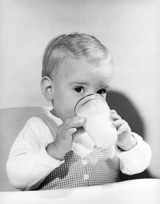 Brother and sister drinking milk Stock Photo - Alamy