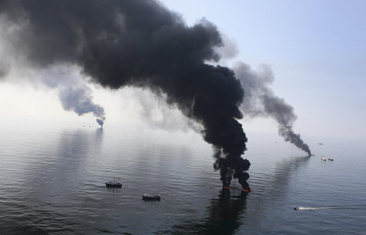 Smoke billows from a controlled burn of spilled oil off the Louisiana coast after the April 2010 Deepwater Horizon explosion killed 11 workers and ruptured BP's deep-sea well.  (Photo: Sean Gardner / Reuters)