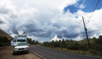 <p>Storm clouds loom over Tonto National Forest, Ariz., where rescuers are still searching for a missing 27-year-old man washed away by floodwaters, Monday, July 17, 2017. Sheriff’s officials said thunderstorms and heavy rain could endanger rescuers searching upstream. A torrent of water came Saturday as people were cooling off in a creek when a rainstorm upstream unleashed floodwaters that killed nearly a dozen people. (AP Photo/Angie Wang) </p>