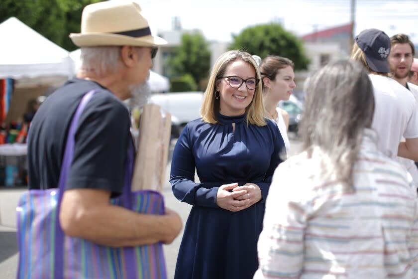 LOS ANGELES, CA - APRIL 10: Lindsey Horvath is running for supervisor in Los Angeles County's District 3. Melrose Place Farmers Market on Sunday, April 10, 2022 in Los Angeles, CA. (Myung J. Chun / Los Angeles Times)