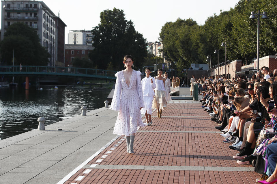 Models wear creations as part of the Marco De Vincenzo Spring-Summer 2020 collection, unveiled during the fashion week, in Milan, Italy, Friday, Sept. 20, 2019. (AP Photo/Antonio Calanni)