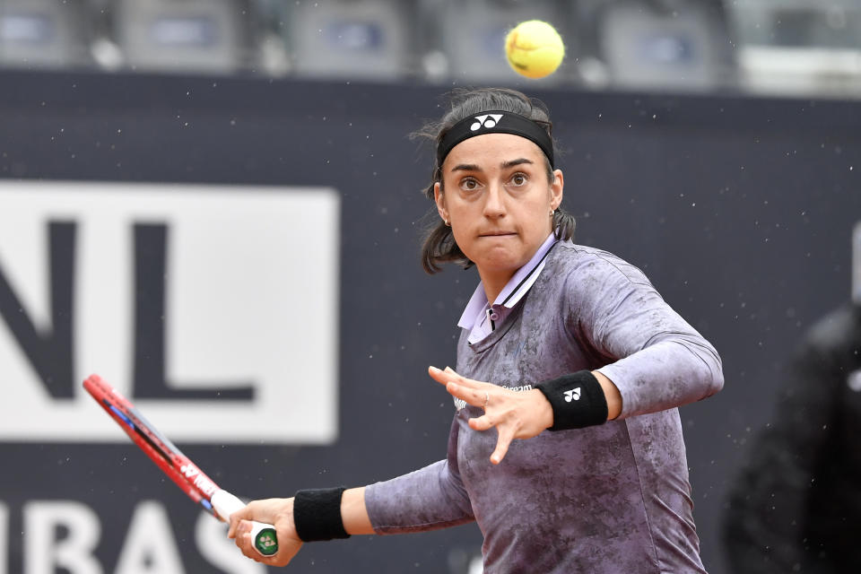 FILE - Caroline Garcia of France returns to Camila Osorio of Colombia during their match at the Italian Open tennis tournament, in Rome, Italy, Saturday, May 13, 2023. Play begins at the French Open on Sunday, May 28, 2023. (AP Photo/Antonietta Baldassarre, File)