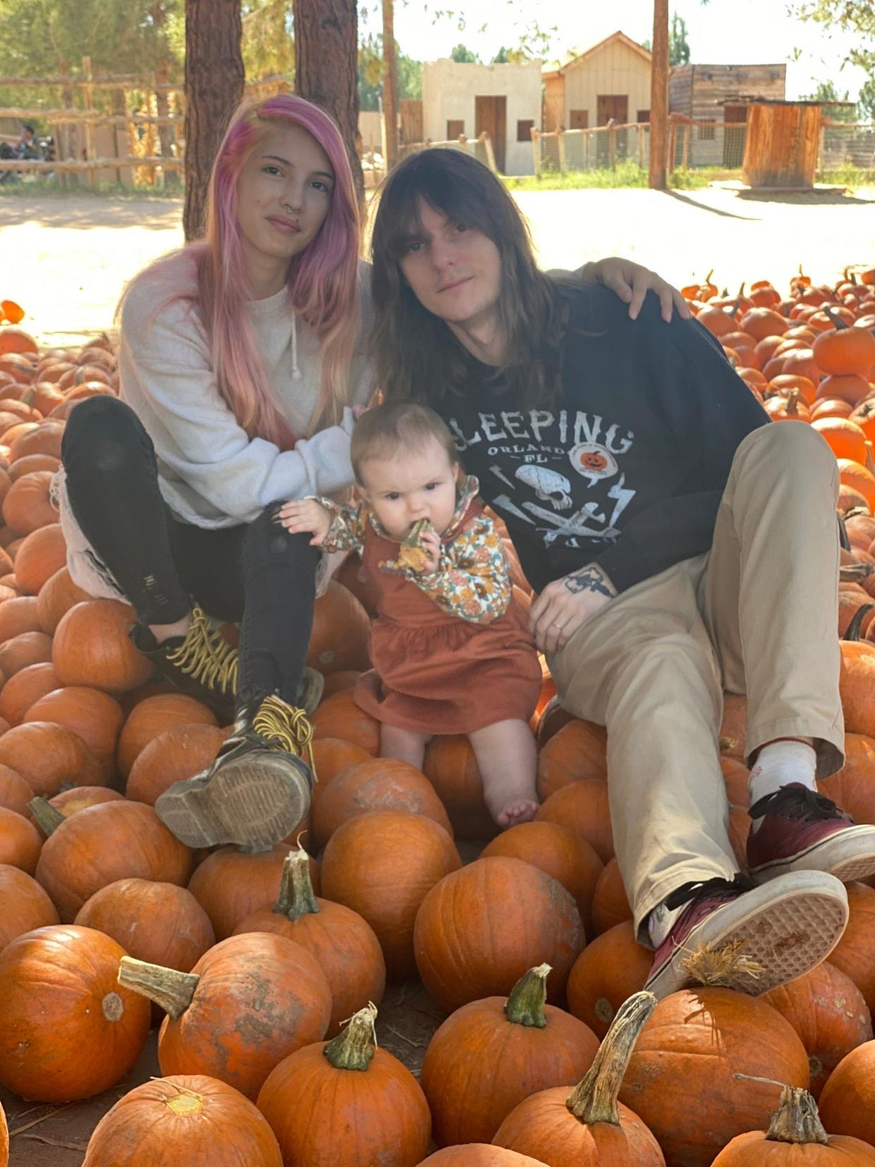 Cooper Lamb (right), the son of Pinal County Sheriff Mark Lamb,  with his fiancé and daughter.