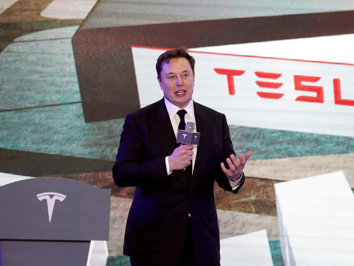 FILE PHOTO: Tesla Inc CEO Elon Musk speaks at an opening ceremony for Tesla China-made Model Y program in Shanghai, China January 7, 2020. REUTERS/Aly Song