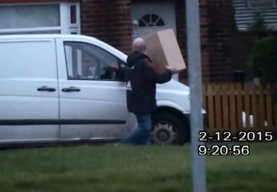 Caught on camera: Paul Carter working as a courier (SWNS) 