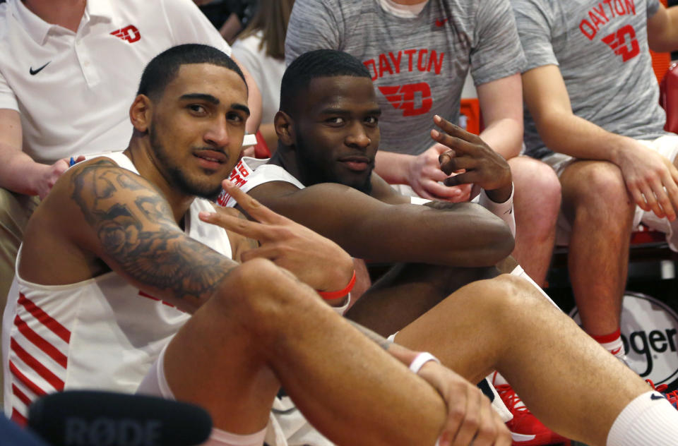 Dayton Flyers forward Obi Toppin (left) and guard Jalen Crutcher (10) react late in the second half of a game against Rhode Island. (David Kohl/USAT)