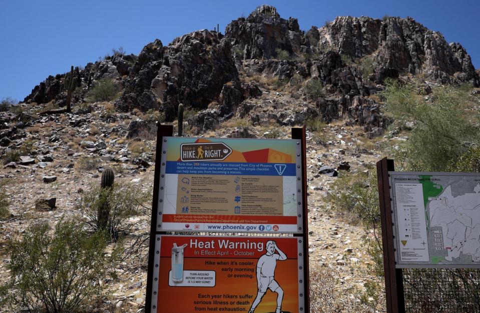 A sign in Arizona warns outdoor hikers about extreme heat. Arizona, which saw its first heat wave of the year in June, is home to the nation’s first-ever Chief Heat Officer (Getty Images)