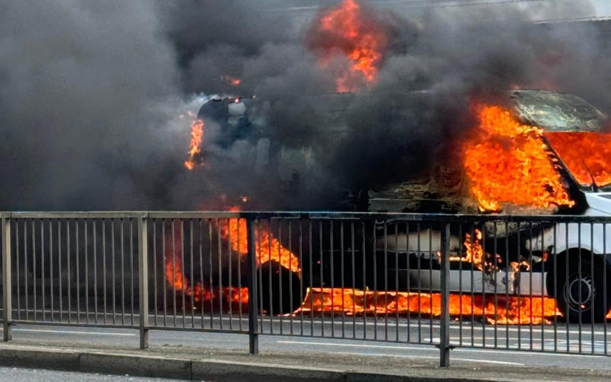 A van on fire in Finchley Road, South Hampstead