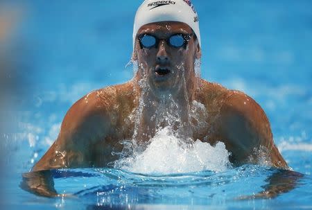 Britain's Michael Jamieson swims in the men's 200m breaststroke heats during the World Swimming Championships at the Sant Jordi arena in Barcelona August 1, 2013. REUTERS/Albert Gea