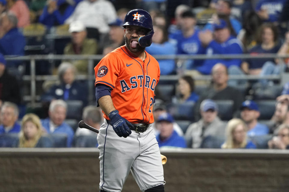 Houston Astros' Jose Altuve walks off the field after striking out in the sixth inning during a baseball game against the Kansas City Royals Tuesday, April 9, 2024, in Kansas City, Mo. (AP Photo/Ed Zurga)