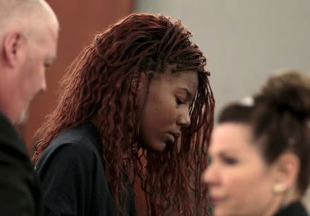 Lakeisha Nicole Holloway, 24, of Oregon, leaves the courtroom after her initial appearance at the Regional Justice Center in Las Vegas, Nevada December 23, 2015. REUTERS/Las Vegas Sun/Steve Marcus