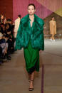 <p>Model wears an emerald fur coat and silk dress at the Milly Fall/Winter 2018 show. (Photo: Courtesy of Greg Kessler) </p>