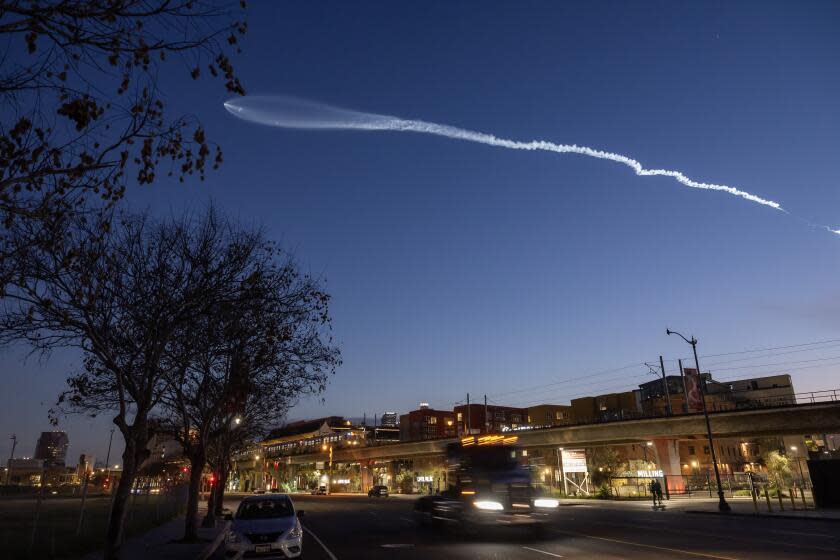 LOS ANGELES, CA- MARCH 18: A SpaceX Falcon 9 rocket launched the Starlink 7-16 mission from Vandenberg Space Force Base on Monday, March 18, 2024 as seen from Chinatown in Los Angeles, CA. (Myung J. Chun / Los Angeles Times)