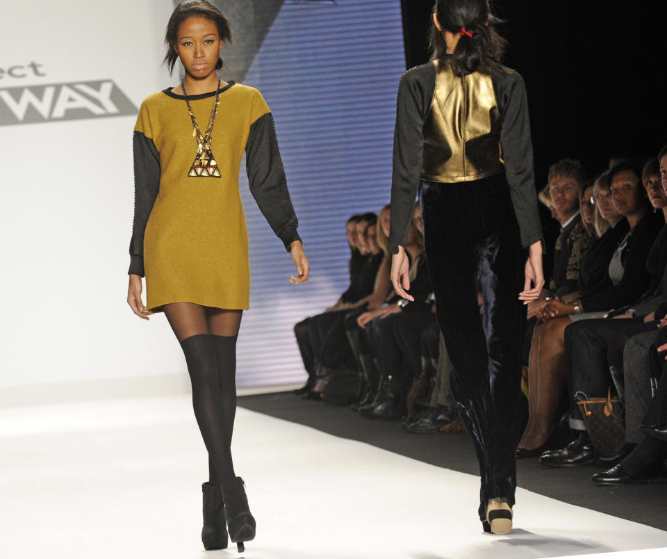 Fashion by the finalists of "The Project Runway" fashion competition series is modeled during Fashion Week, Friday Feb. 8, 2013, in New York. (AP Photo/Louis Lanzano)