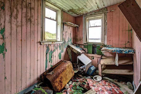 Mandatory Credit: Photo by Deadline News/REX_Shutterstock (4805408d) One of John Maher's photos of abandoned homes on the Western Isles Photos taken by Buzzcocks drummer John Maher could bring abandoned island homes back to life, Scotland - May 2015 *Full story: http://www.rexfeatures.com/nanolink/qfyt Pictures taken by the former drummer of the Buzzcocks are set to bring up to 1,000 abandoned island homes back to life. Eerily beautiful pictures of the derelict croft houses slowly rotting away in the Western Isles were taken by former Buzzcocks drummer John Maher. The remarkable images featured in an exhibition and have now led to talks with one of the worldï¿½s biggest charitable foundations, The Carnegie Trust, in a bid to make them habitable again. There are about 1,000 empty properties frozen in time, many of which have been empty since their owners passed away or moved to the mainland. Meanwhile there is a big housing problem with around 1,000 people waiting for a home on the islands. A housing agency now plans to renovate the first properties this autumn in a project that could save the islandsï¿½ dwindling rural communities. 