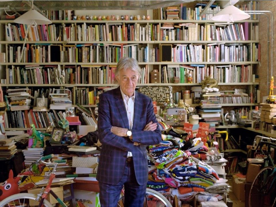 surrounded by his precious books and objects, at his central London HQ - Bill Murphy