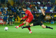 KHARKOV, UKRAINE - JUNE 17: Cristiano Ronaldo of Portugal scores his team's first goal during the UEFA EURO 2012 group B match between Portugal and Netherlands at Metalist Stadium on June 17, 2012 in Kharkov, Ukraine. (Photo by Lars Baron/Getty Images)