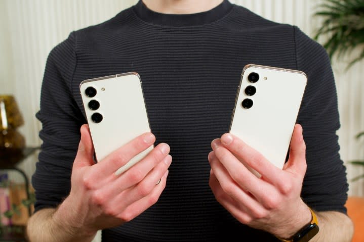 Joe Maring holding a Samsung Galaxy S23 and a Samsung Galaxy S23 Plus.