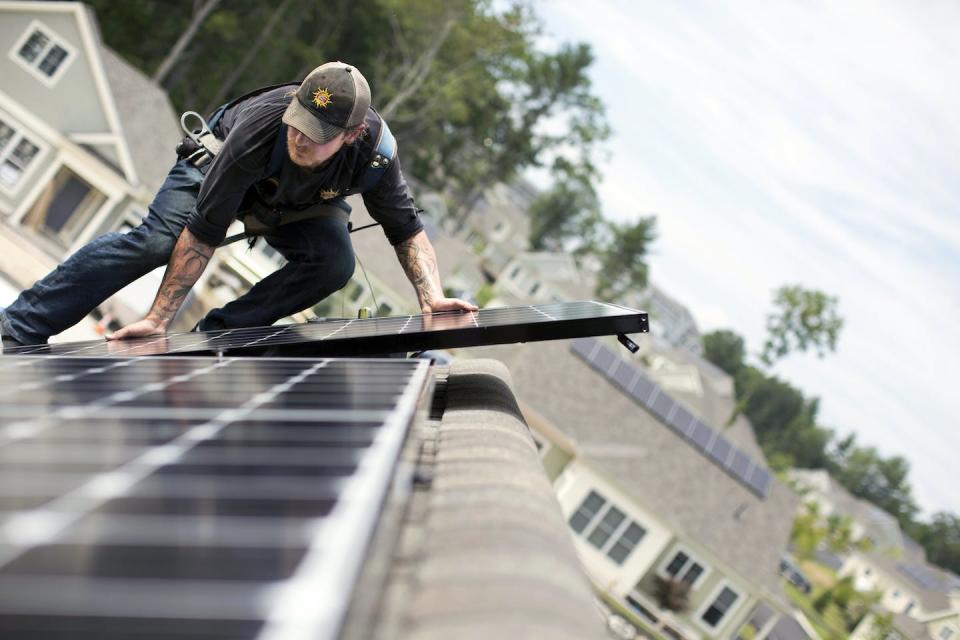 Solar panels have become increasingly common on homes, businesses and parking lots as prices have fallen. <a href="https://www.gettyimages.com/detail/news-photo/jack-doherty-photovoltaic-project-manager-for-revision-news-photo/825984340" rel="nofollow noopener" target="_blank" data-ylk="slk:Ben McCanna/Portland Press Herald via Getty Images;elm:context_link;itc:0;sec:content-canvas" class="link ">Ben McCanna/Portland Press Herald via Getty Images</a>