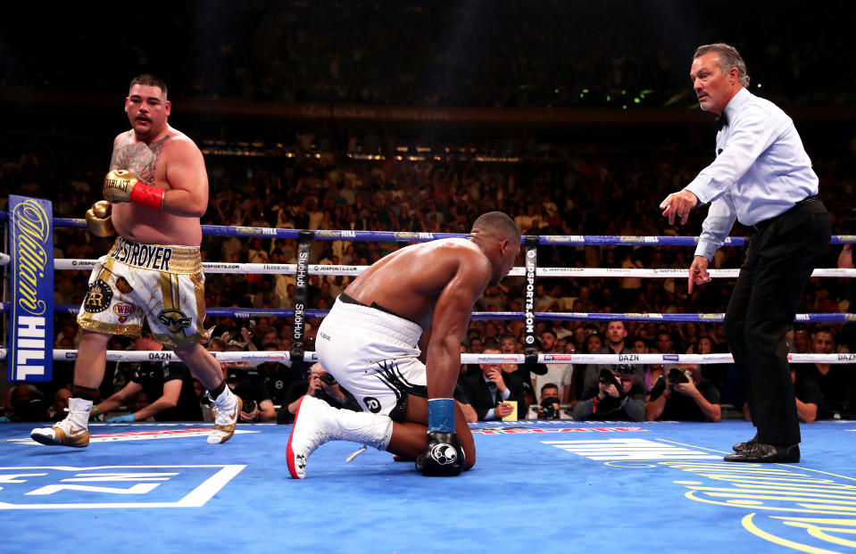 Anthony Joshua (centre) in action against Andy Ruiz Jr (left) in the WBA, IBF, WBO and IBO Heavyweight World Championships title fight at Madison Square Garden, New York.