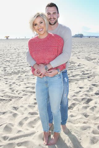 <p>Paul Archuleta/Getty</p> (L-R) Savannah Chrisley and Nic Kerdiles are pictured celebrating their engagement on March 27, 2019, in Santa Monica, California.