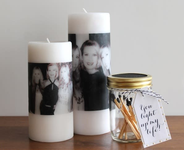 <p>Who doesn't love a nice new candle? Make the gift even better by personalising it with a photo using transfer paper.<a rel="nofollow noopener" href="https://ideas.evite.com/2013/05/mothers-day-diy-photo-candle/#.UYagyrXigfU" target="_blank" data-ylk="slk:[Photo: Evite];elm:context_link;itc:0;sec:content-canvas" class="link "><em> [Photo: Evite]</em></a> </p>