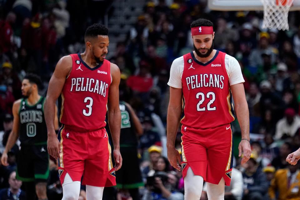 New Orleans Pelicans guard CJ McCollum (3) and forward Larry Nance Jr. (22) walk down the court after a foul late in the second half of an NBA basketball game against the Boston Celtics in New Orleans, Friday, Nov. 18, 2022. The Celtics won 117-109. (AP Photo/Gerald Herbert)