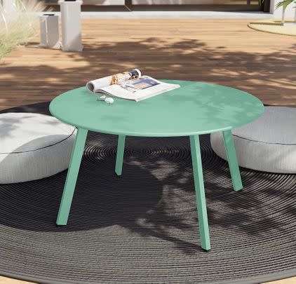 And stick with the colourful vibe by going for this mint green coffee table