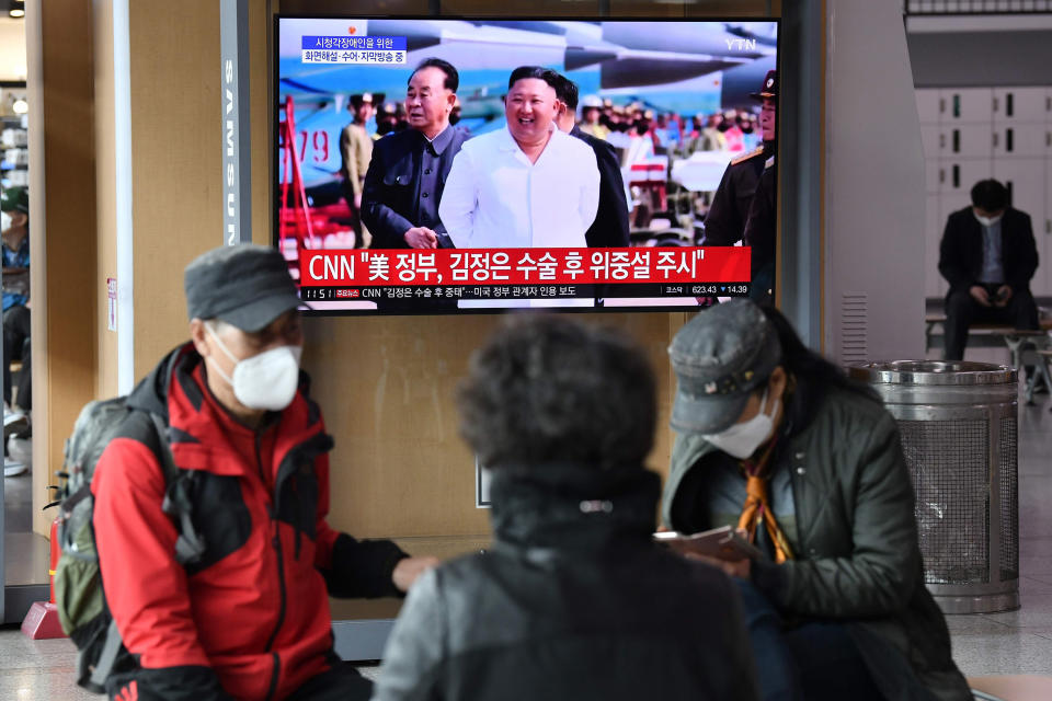 Image: People watch a television news broadcast showing file footage of North Korean leader Kim Jong Un, at a railway station in Seoul (Jung Yeon-je / AFP - Getty Images)