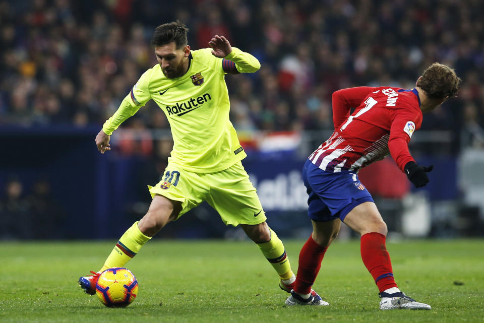 Messi et Griezmann. (AP Photo/Paul White)