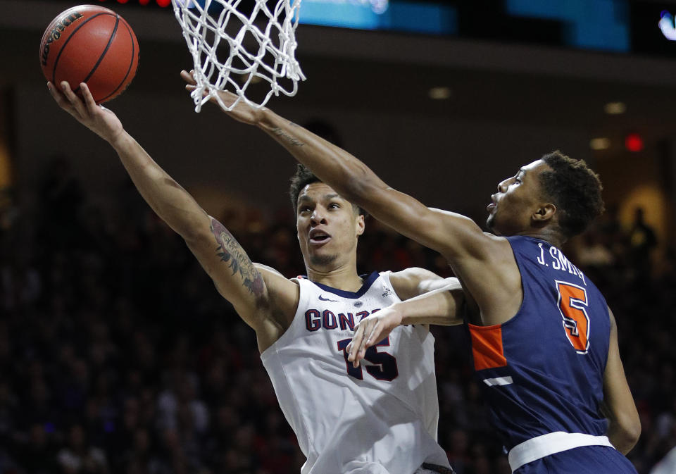 Gonzaga's Brandon Clarke shoots around Pepperdine's Jade' Smith during the first half of an NCAA semifinal college basketball game at the West Coast Conference tournament, Monday, March 11, 2019, in Las Vegas. (AP Photo/John Locher)