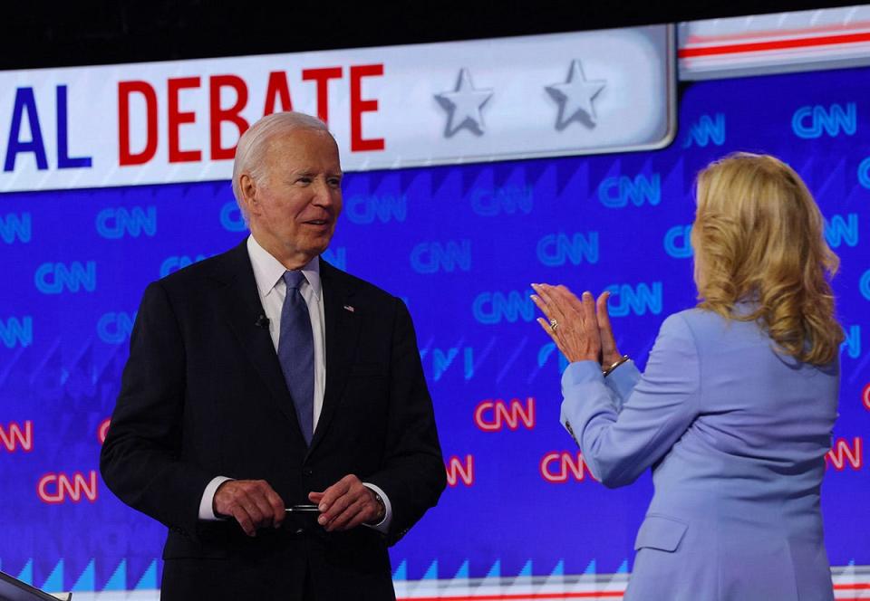 Democrat candidate, U.S. President Joe Biden, speaks with first lady Dr. Jill Biden after the conclusion of a presidential debate with Republican candidate, former U.S. President Donald Trump, in Atlanta, Georgia, U.S., June 27, 2024.