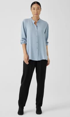 A collared silk blouse that feels as luxurious as it looks