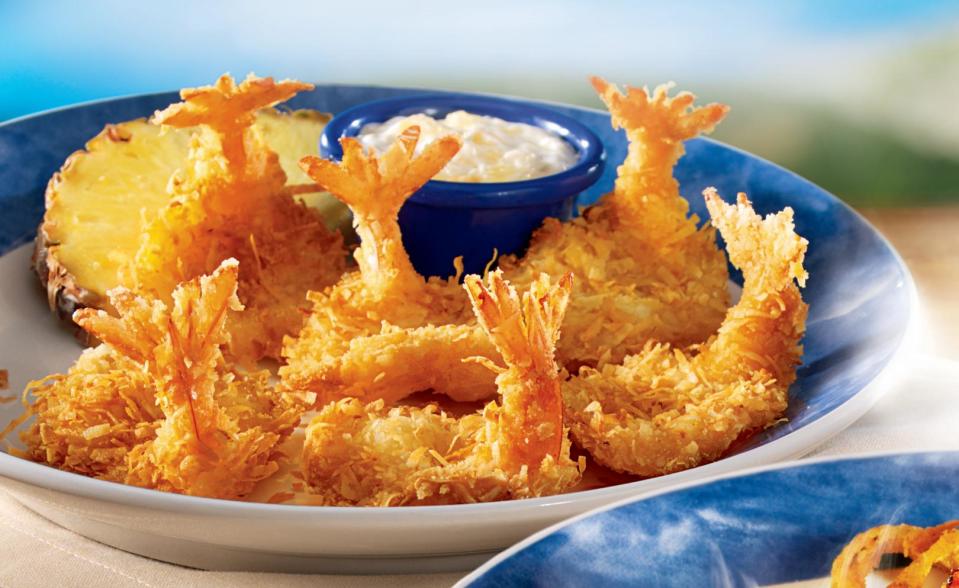 <b>Red Lobster's Parrot Bay Coconut Shrimp</b><br> This crispy, crunchy coconut shrimp is a fan favorite. Make this tasty dish at home <span>here</span>.