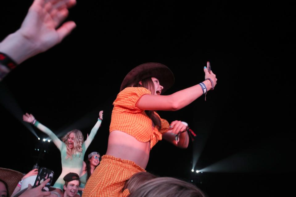 Fans of Kane Brown watch his headlining performance on the Mane Stage during Stagecoach country music festival at the Empire Polo Club in Indio, Calif., Saturday, April 29, 2023.