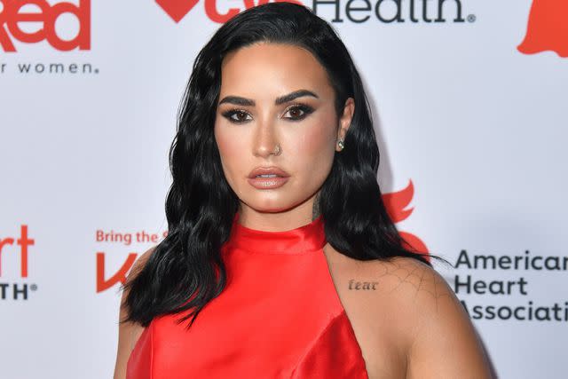 <p>Erik Pendzich/Shutterstock</p> Demi Lovato at the American Heart Association's Go Red for Women Red Dress Collection Concert in January 2024