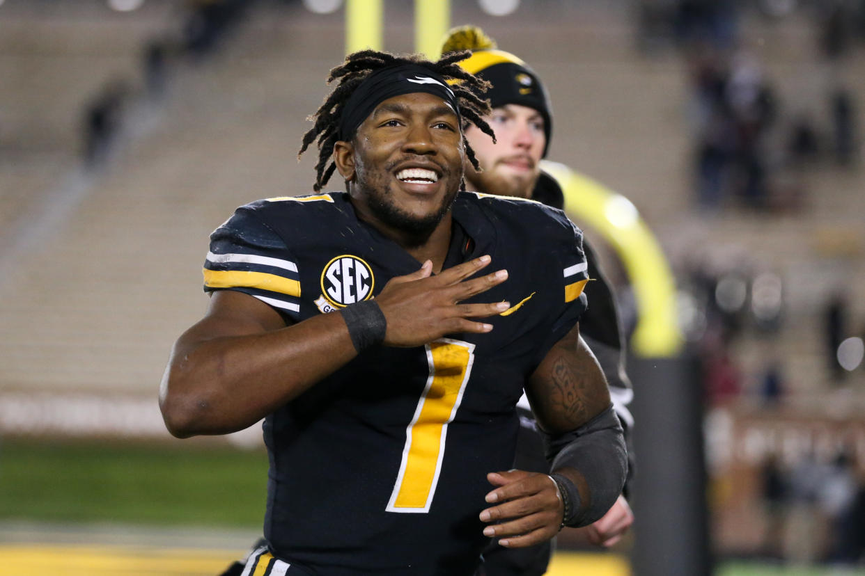 COLUMBIA, MO - NOVEMBER 13: Missouri Tigers running back Tyler Badie (1) is all smiles as he runs off the field after an SEC football game between the South Carolina Gamecocks and Missouri Tigers on Nov 13, 2021 at Memorial Stadium in Columbia, MO.  (Photo by Scott Winters/Icon Sportswire via Getty Images)