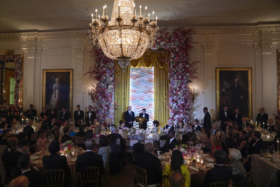 President Joe Biden listens as Japanese Prime Minister Fumio Kishida speaks ahead of a toast during a State Dinner at the White House, Wednesday, April 10, 2024, in Washington. (AP Photo/Evan Vucci)