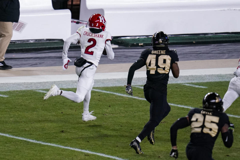 Rutgers' Aron Cruickshank (2) gets past Purdue's Zane Greene (49) on his way to a touchdown on a 100-yard kickoff return during the third quarter of an NCAA college football game in West Lafayette, Ind., Saturday, Nov. 28, 2020. (AP Photo/Michael Conroy)