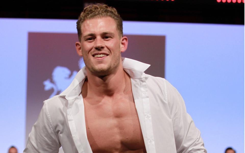 Jack showing off all that hard work at the gym on the Mr England catwalk - Credit: Graham Stone/REX/Shutterstock