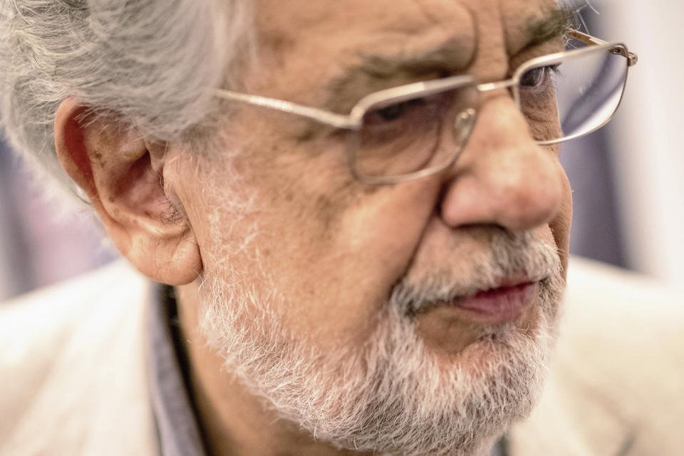 In this Friday, July 12, 2019, photo, Placido Domingo speaks during a news conference about his upcoming show "Giovanna d'Arco" in Madrid, Spain. Eight opera singers and a dancer have told The Associated Press that they were sexually harassed by Domingo, one of the most celebrated and powerful men in opera. The women say the encounters took place over three decades, at venues that included opera companies where he held top managerial positions. (AP Photo/Bernat Armangue)